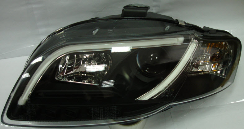 Ауди A4 фара левая и правая Комплект тюнинг линзованная Devil Eyes с Светящ.Секциями регулировочный мотор Sonar внутри черная