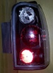 Toyota  4 Runner фонарь задний внешний Л+П (комплект) тюнинг Eagle Eyes черный с красным