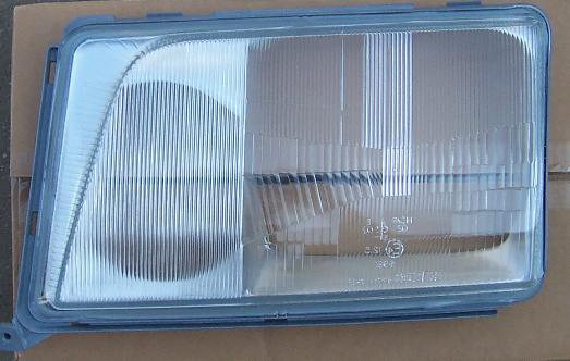 Мерседес W124 стекло фары левое с рамкой Depo